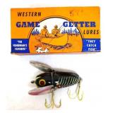 Vintage lure box with a lure