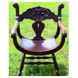 Vintage mahogany fireside chair w/ carved back
