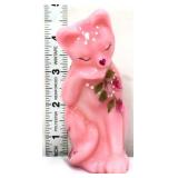 Fenton rosalene grooming cat with roses