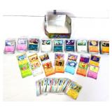 Lot of assorted Pokemon cards in tin