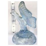 Fenton pale blue iridescent butterfly on branch