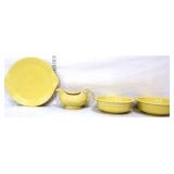 4 pieces of yellow Fiesta dishware