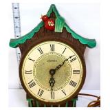Vntg electric Spartus birdhouse clock