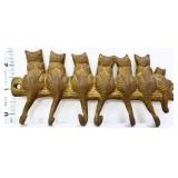 Cast iron cat tail tie holder