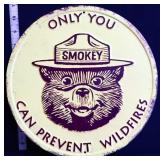 Round metal Only You Smokey Bear sign