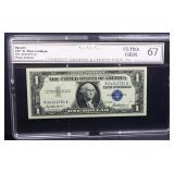 Graded 67 1957 $1 blue seal silver certificate