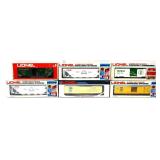 Lot of 6 Lionel train cars in boxes