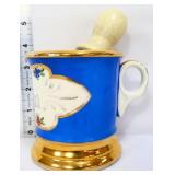 Vintage blue/gold shaving mug with brush