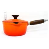 Flame orange enameled cast iron sauce pan w/ lid