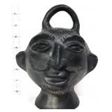 Vntg black 8in head coin bank