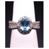 Oval cut blue topaz ring, lab created