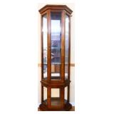 Lighted mirror back curio cabinet