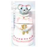 Grey mouse in pink dress cookie jar