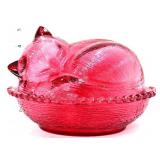 Cranberry flash sleeping cat on nest
