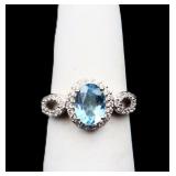 Sterling oval blue topaz ring, lab created