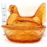 LE Smith amber hen on nest