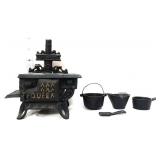 Cast iron black mini stove w/utensils