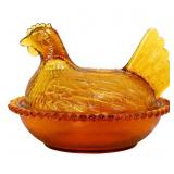 Vintage amber hen on nest