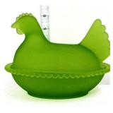 Vintage green satin hen on nest