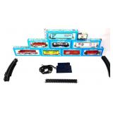 Mixed estate lot, inc train cars in org boxes