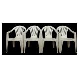 Four White Plastic Chairs
