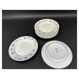 Eight Oneida China Flower Salad Plates