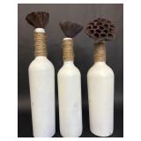 Three White Bottles with Dried Lotus Pods