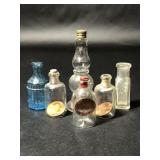 Pennies in Mini Glass Bottles, Blue Glass Bottle
