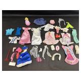 Assortment of Doll Clothes & Mattel Toy