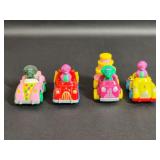 Four 1993 Barney & Baby Bop Diecast Toy Cars