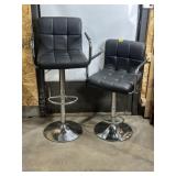 2 SWIVAL ADJUSTABLE BLACK PADDED STOOLS