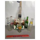 6 PACK OF VINTAGE SODA BOTTLES IN 7UP CARRIER