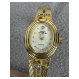 SARAH COVENTRY WOMENS WRIST WATCH W/ CROSSES
