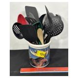 SEVERAL KITCHEN UTENSILS IN MOOSE JAR