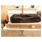 NEW IN BOX ROLLING LUGGAGE BAG