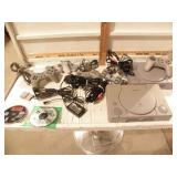 2 PLAYSTATIONS, SEVERAL CONTROLLERS, 2 GAMES