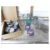 OLD JARS AND SEVERAL GLASS JAR LIDS