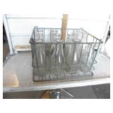 METAL CRATE FULL OF MILK BTLS