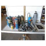 SEVERAL OLD PROPANE TANKS AND TORCHES
