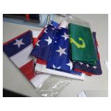 STACK OF AMERICAN & ASSORTED FLAGS