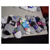 11 BUNDLES OF MIXED SOCKS