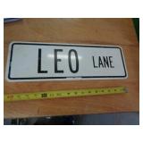 LEO LANE DOUBLE SIDED METAL SIGN LEO LANE DOUBLE SIDED METAL SIGN