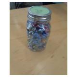 JAR OF FLATTENED MARBLES JAR OF FLATTENED MARBLES