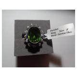 PERIDOT SZ 7 RING / TAG SAYS GERMAN SILVER PERIDOT SZ 7 RING / TAG SAYS GERMAN SILVER