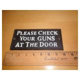 HEAVY CAST IRON SIGN - CHECK YOUR GUNS HEAVY CAST IRON SIGN - CHECK YOUR GUNS