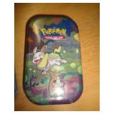 POKEMON TIN W CARDS