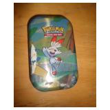 POKEMON TIN W CARDS