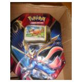 POKEMON TIN W CARDS / DENTED
