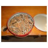 TIN FULL OF BOLTS