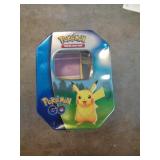 POKEMON TIN W CARDS / HAS DENT POKEMON TIN W CARDS / HAS DENT